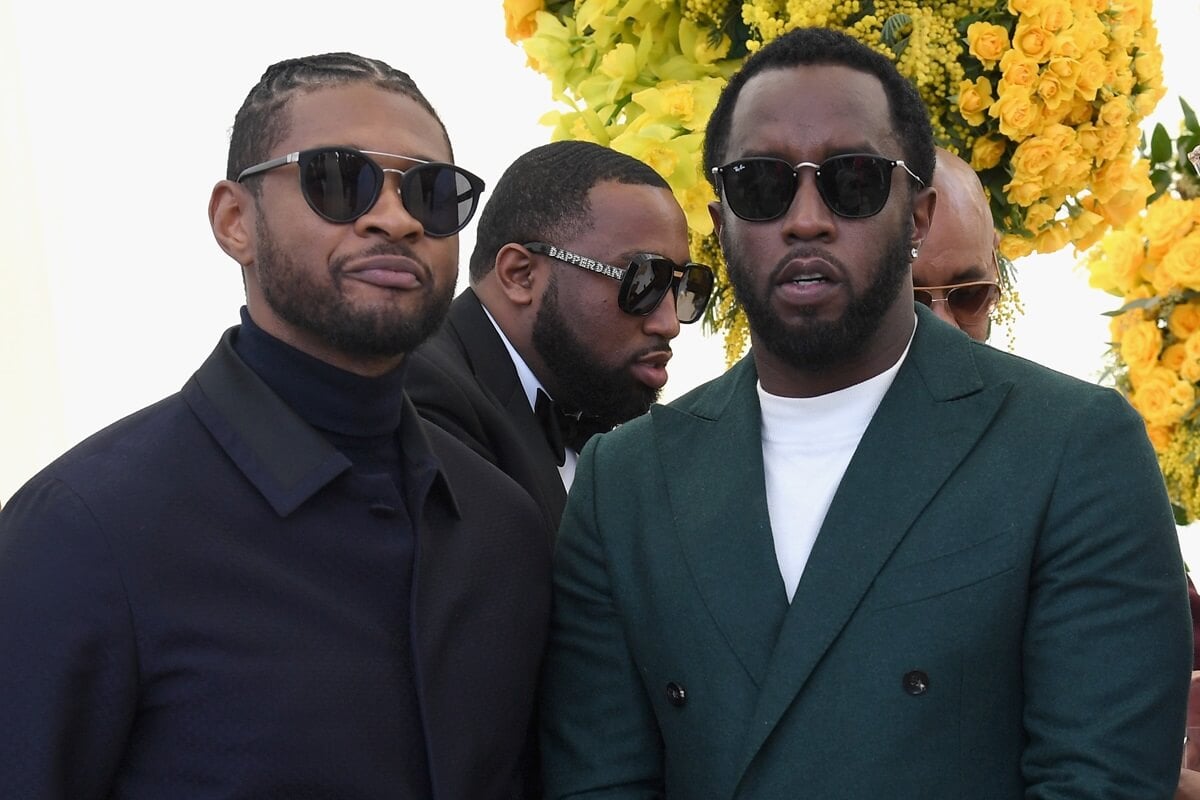 Usher posing alongside Diddy at the Roc Nation Brunch.