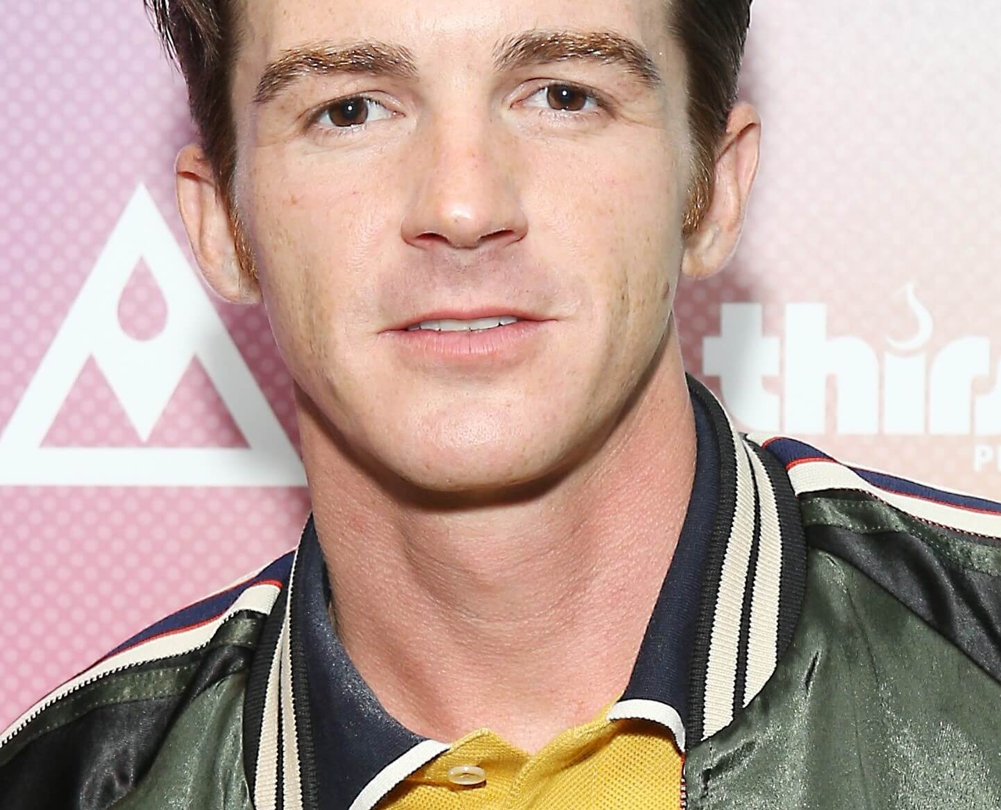 Drake Bell wearing green