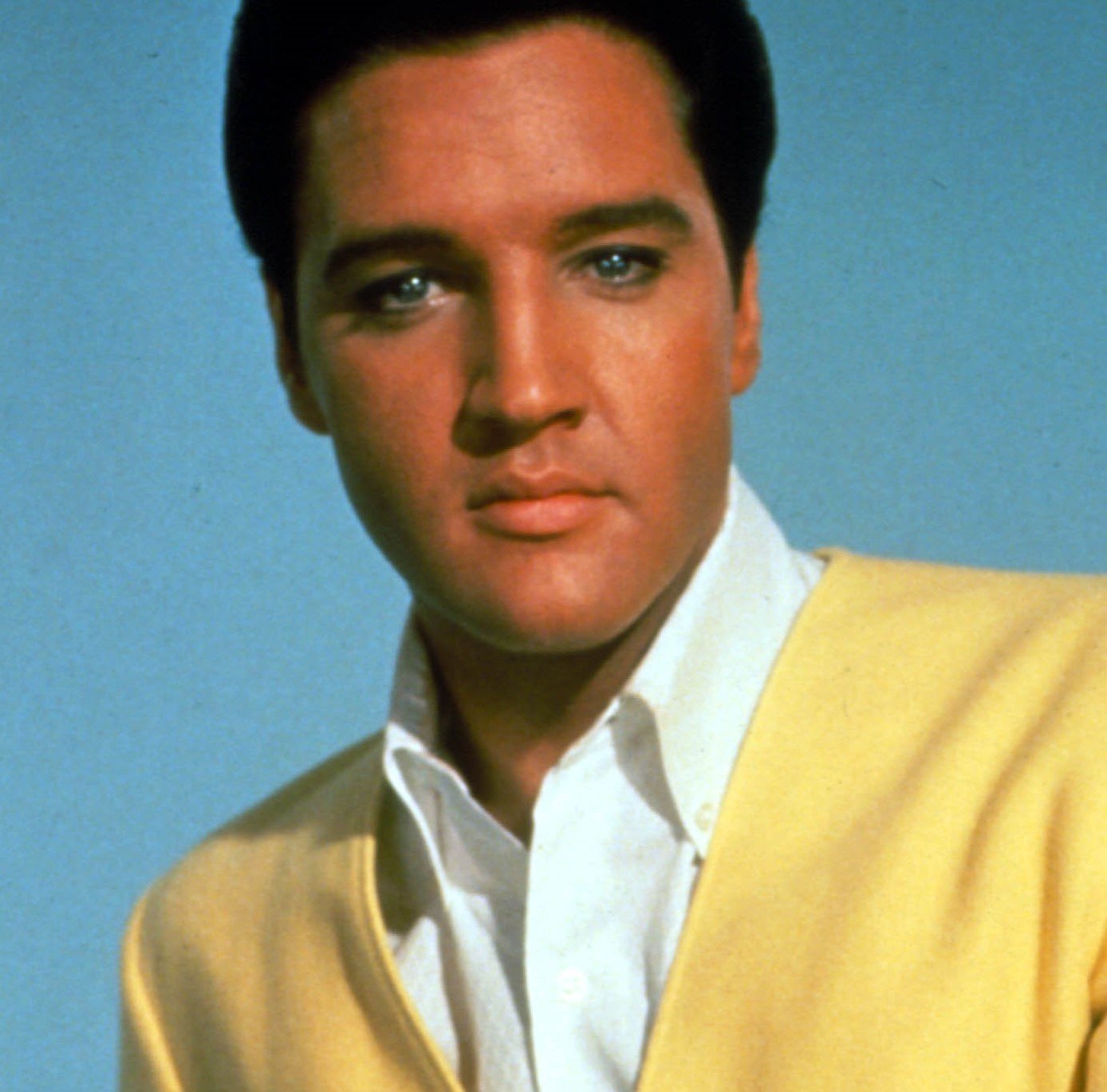 "Don't Cry Daddy" singer Elvis Presley wearing yellow