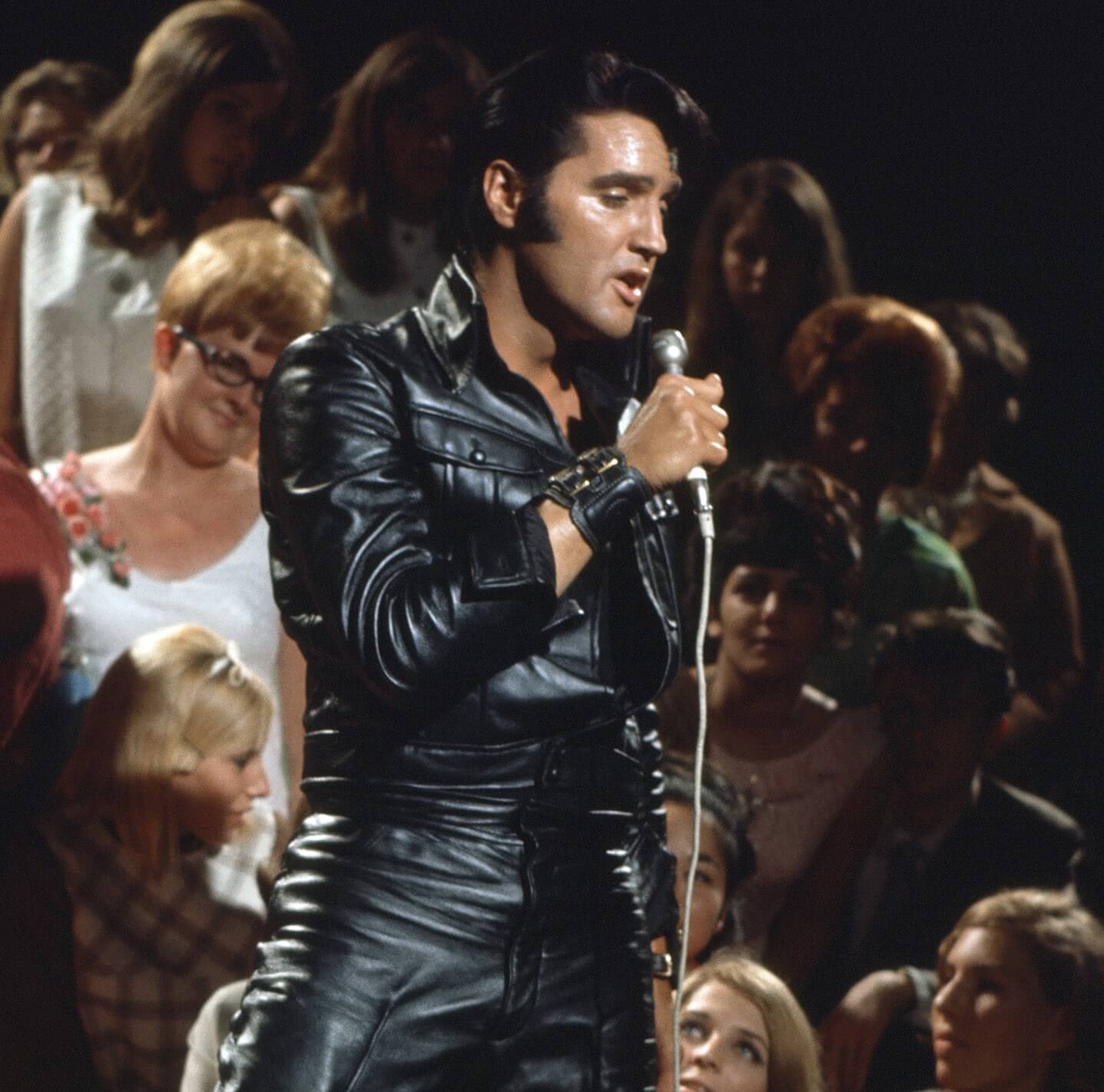 "In the Ghetto" singer Elvis Presley wearing black