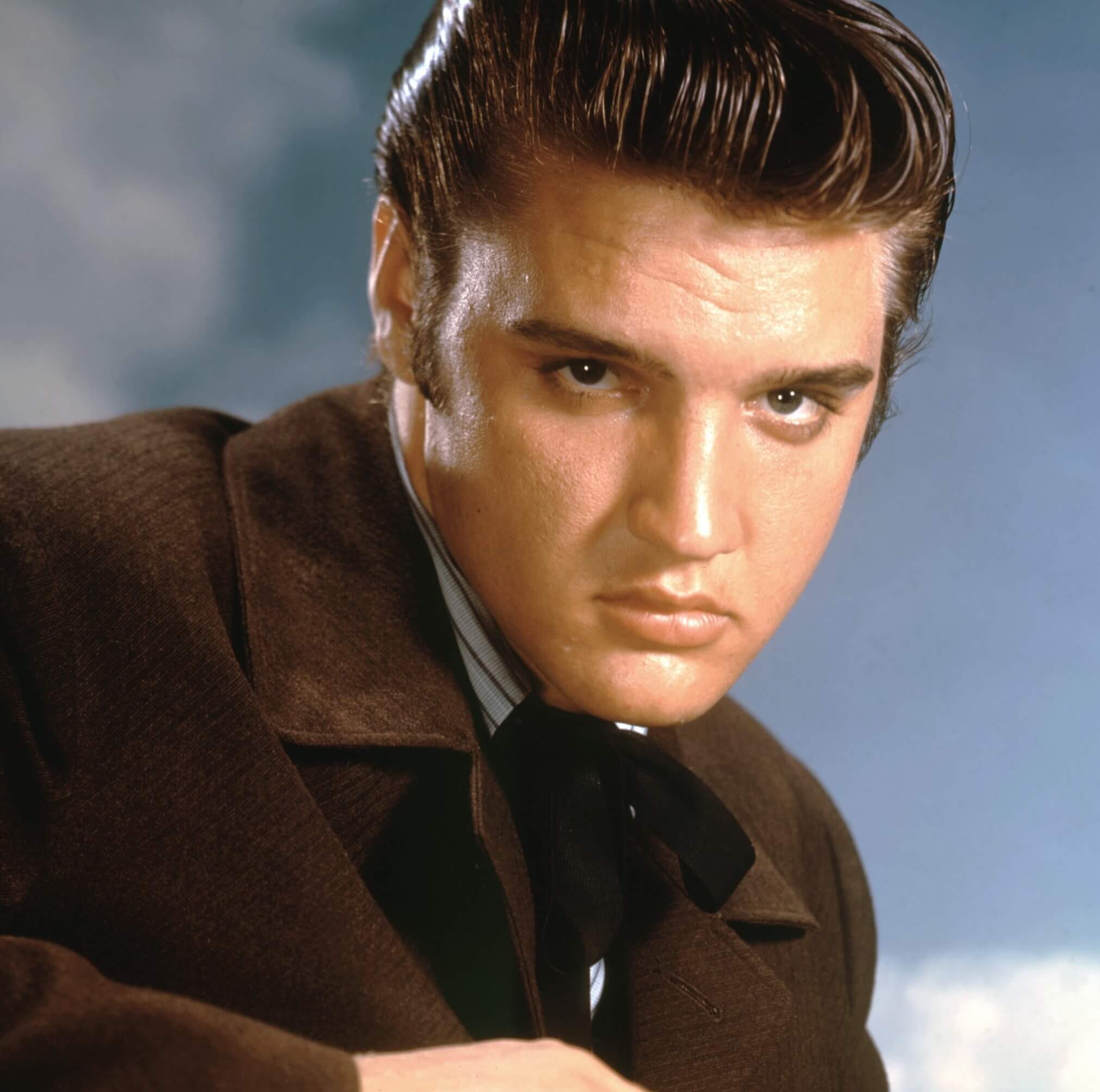 Elvis Presley wearing brown