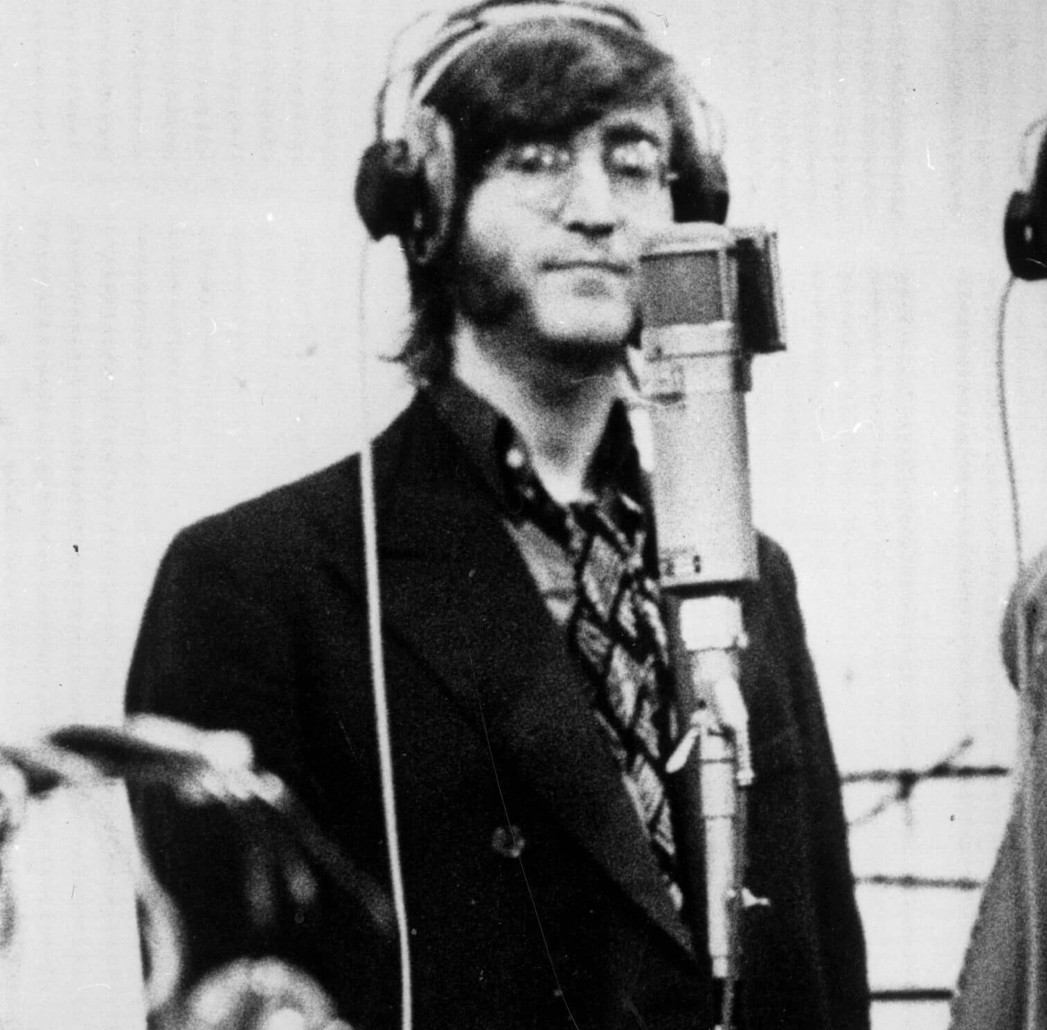 "Give Peace a Chance" singer John Lennon with a microphone