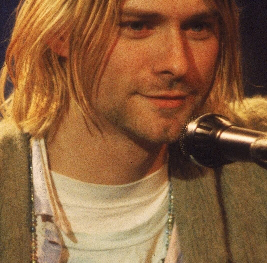 Kurt Cobain wearing a sweater