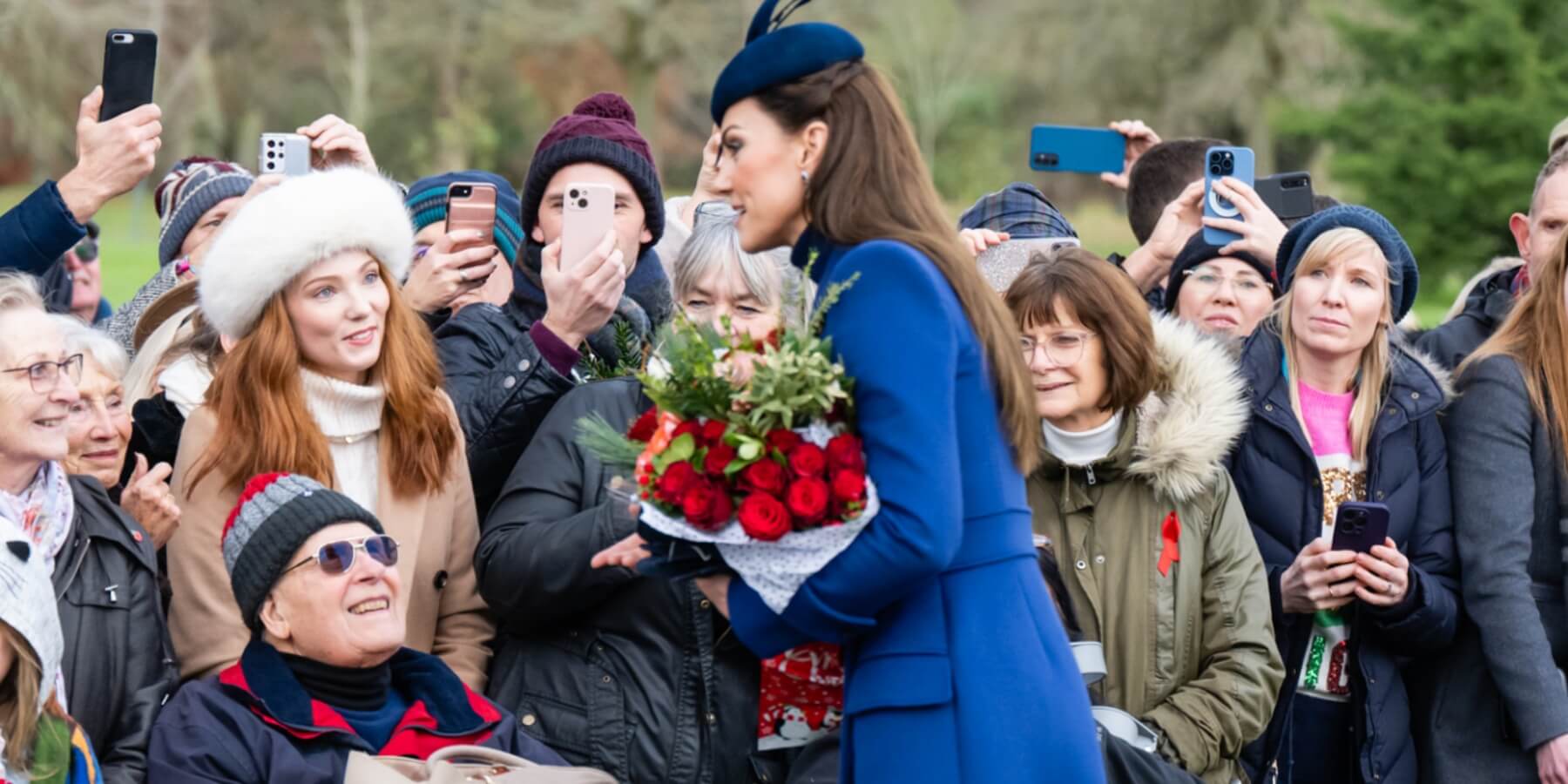 Kate Middleton meets crowds gathered to welcome the royal family on Christmas Day 2023.