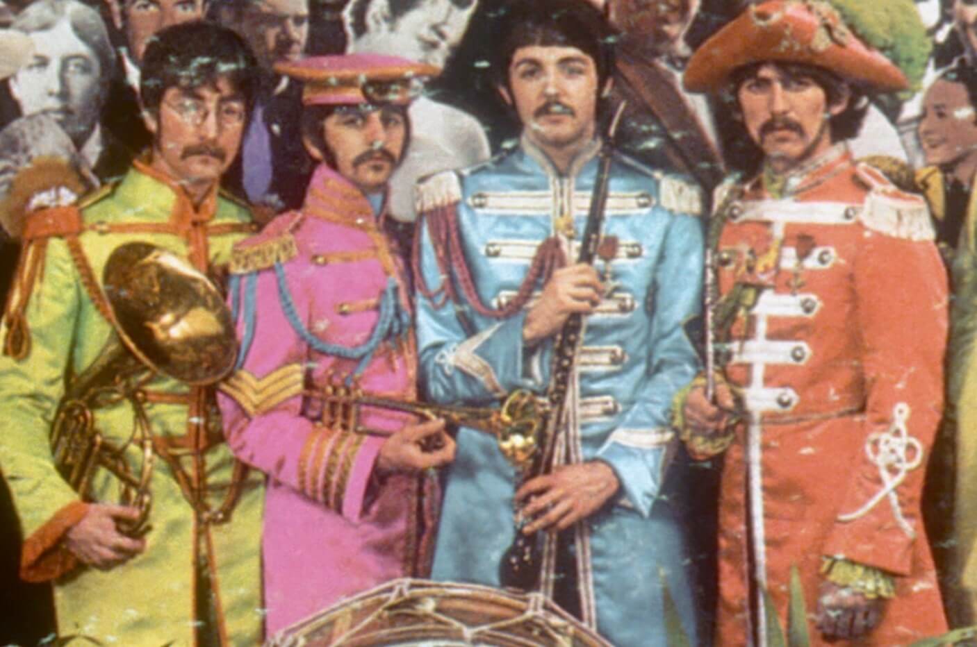 John Lennon, Ringo Starr, Paul McCartney, and George Harrison on the cover of The Beatles' 'Sgt. Pepper'