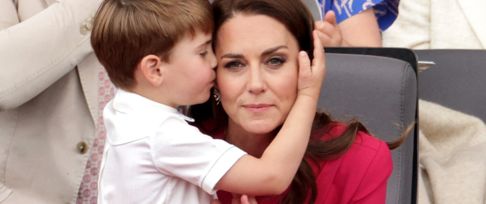 Prince Louis hugs Kate Middleton