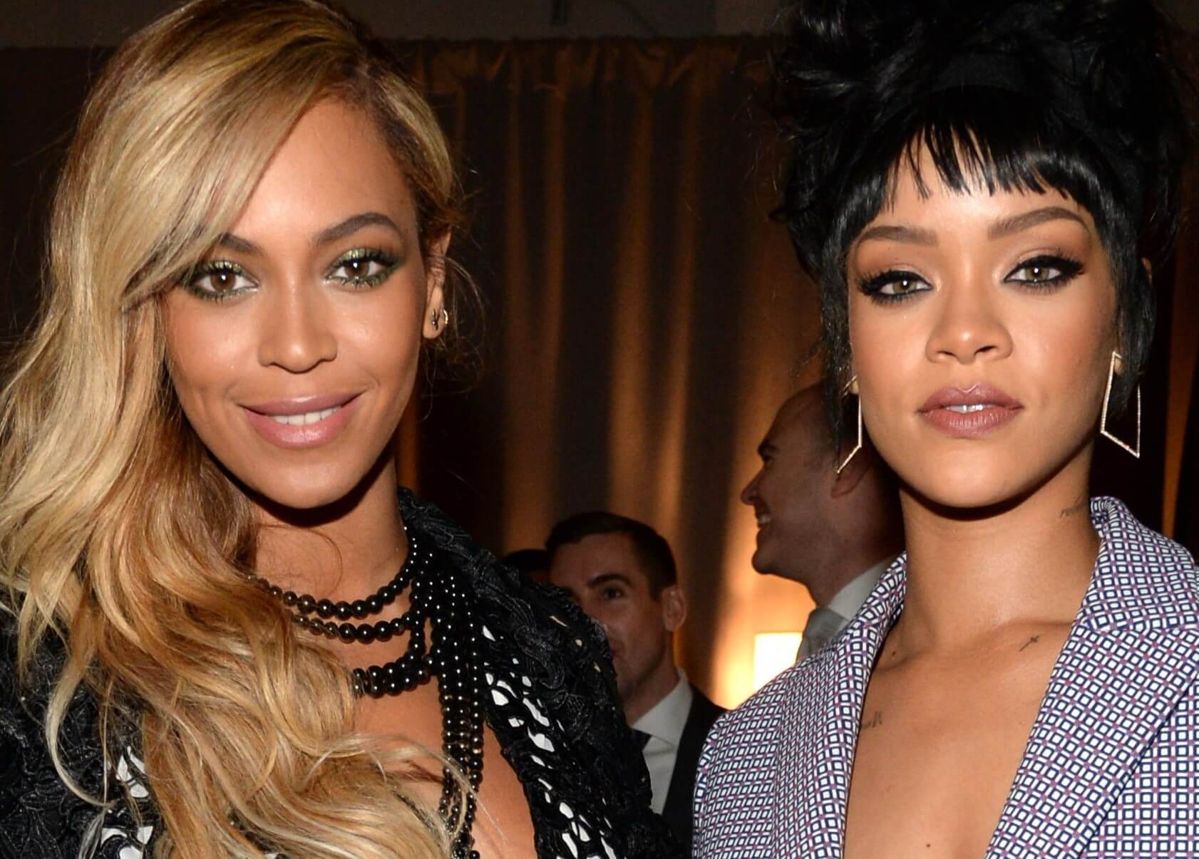 Beyoncé next to Rihanna