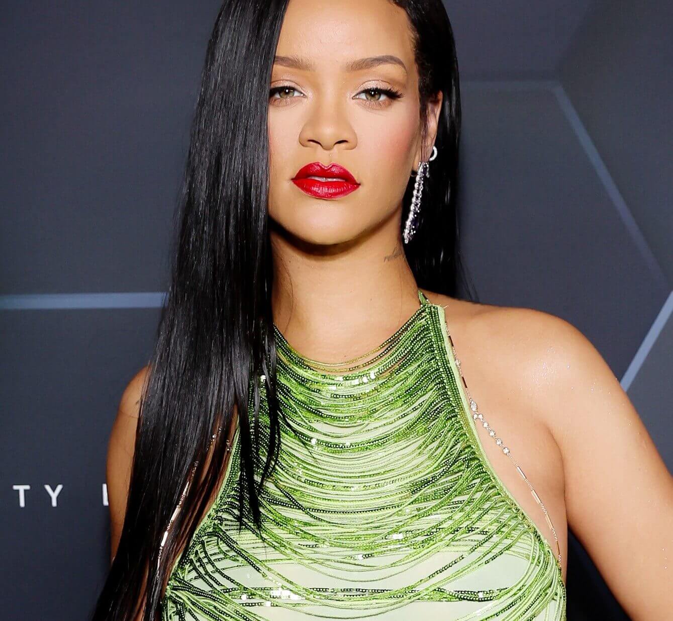 "Pon de Replay" singer Rihanna wearing green