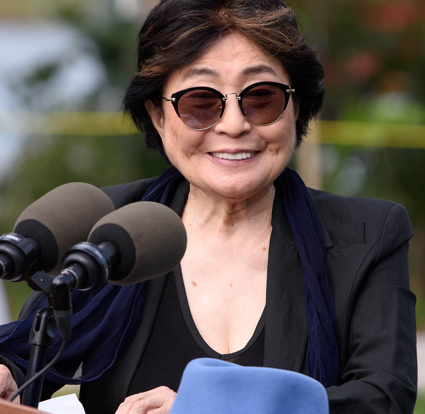 Yoko Ono wearing glasses