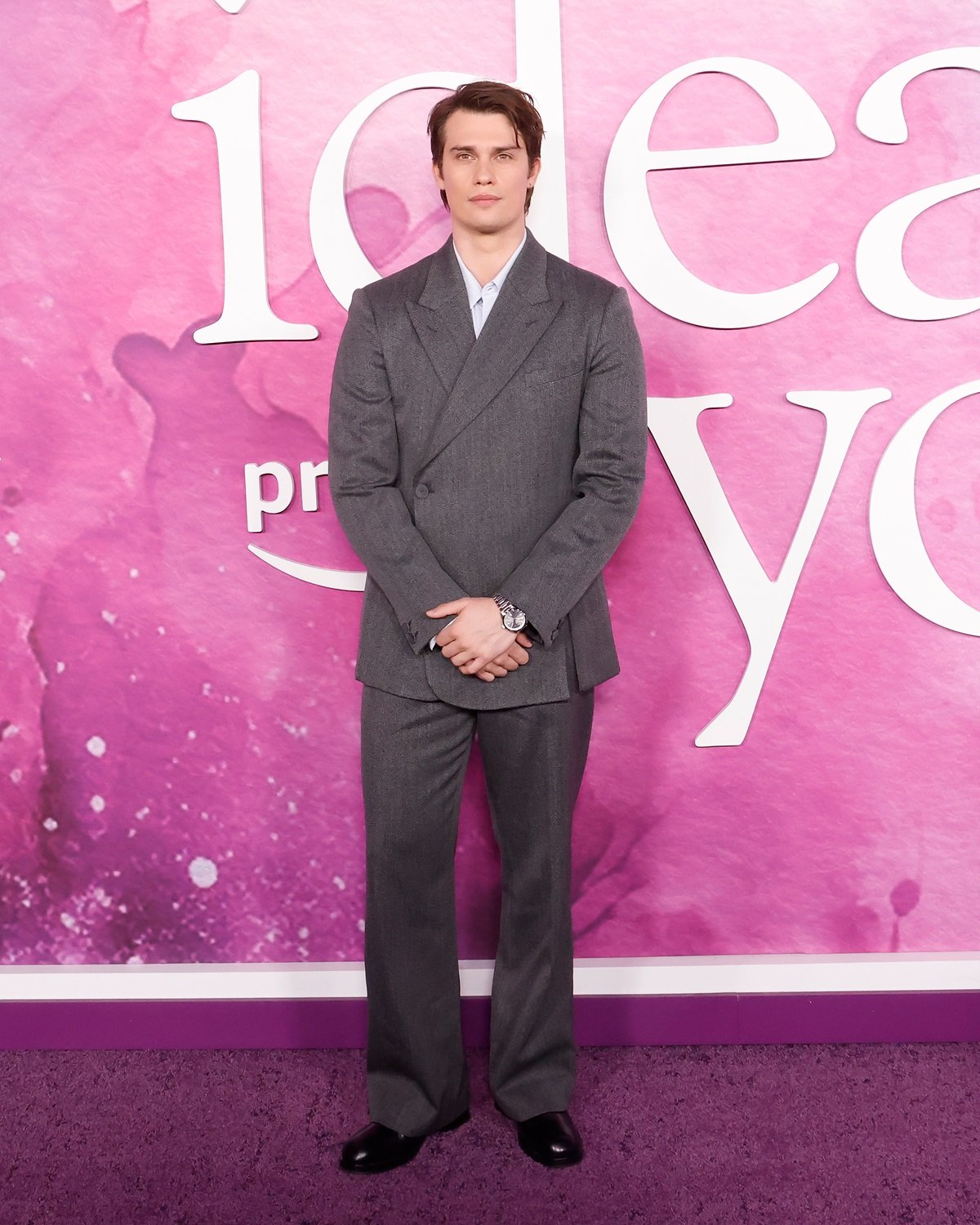 Nicholas Galitzine posing at the premiere of 'The Idea of You'.
