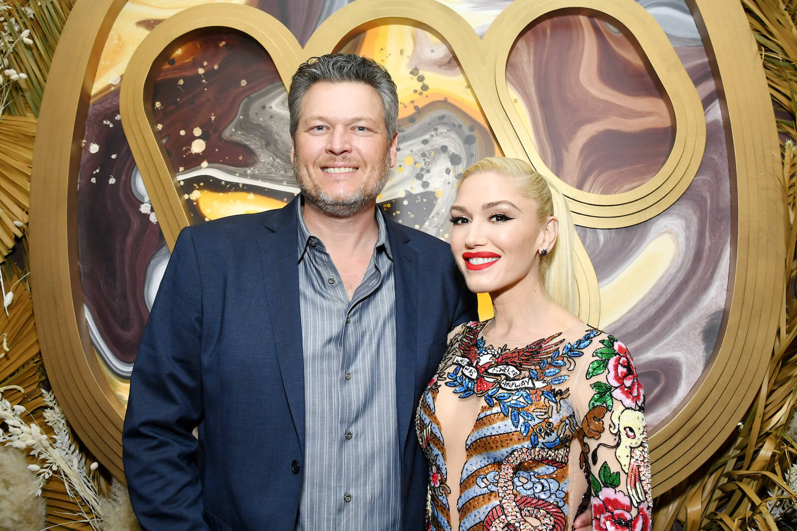 Gwen Stefani and Blake Shelton smiling at an event in 2020
