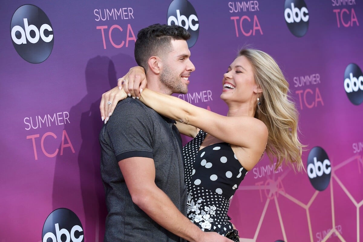 Chris Randone and Krystal Nielson of 'Bachelor in Paradise' with their arms around each other at TCA 2019