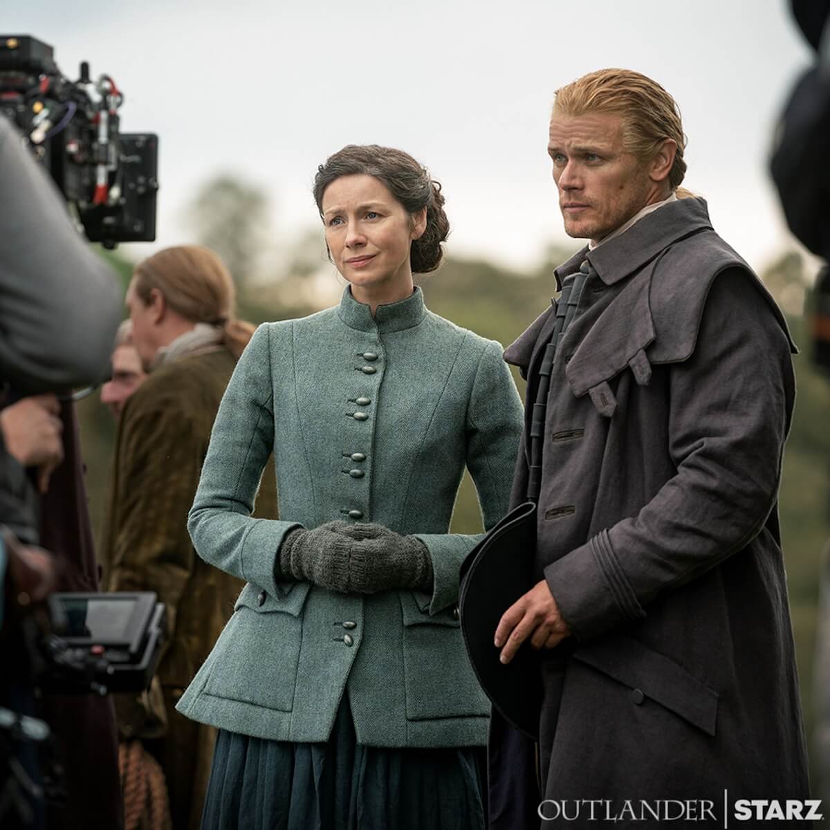 Caitriona Balfe and Sam Heughan filming an episode of 'Outlander'