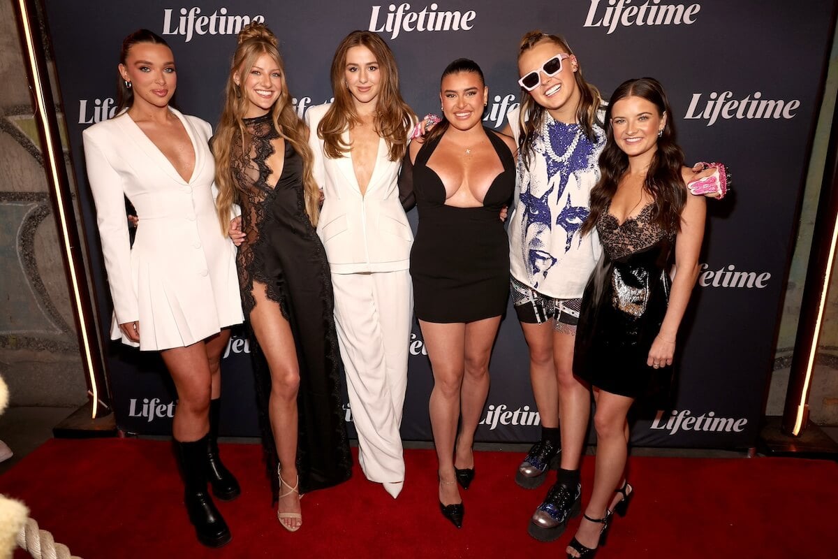 Smiling photo of the cast at the 'Dance Moms: The Reunion' premiere