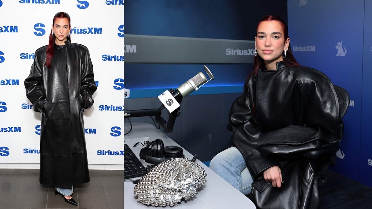 Singer Dua Lipa wears a black leather trench coat and poses for photos at the SiriusXM Studios in NYC