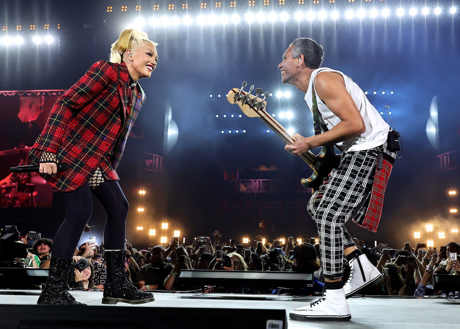 Gwen Stefani and Tony Kanal of No Doubt dancing on stage at Coachella Music and Arts Festival in 2024