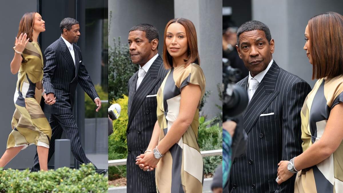 Actors Denzel Washington and Ilfenesh Hadera stand together in front of an NYC high-rise as they film a scene for High and Low