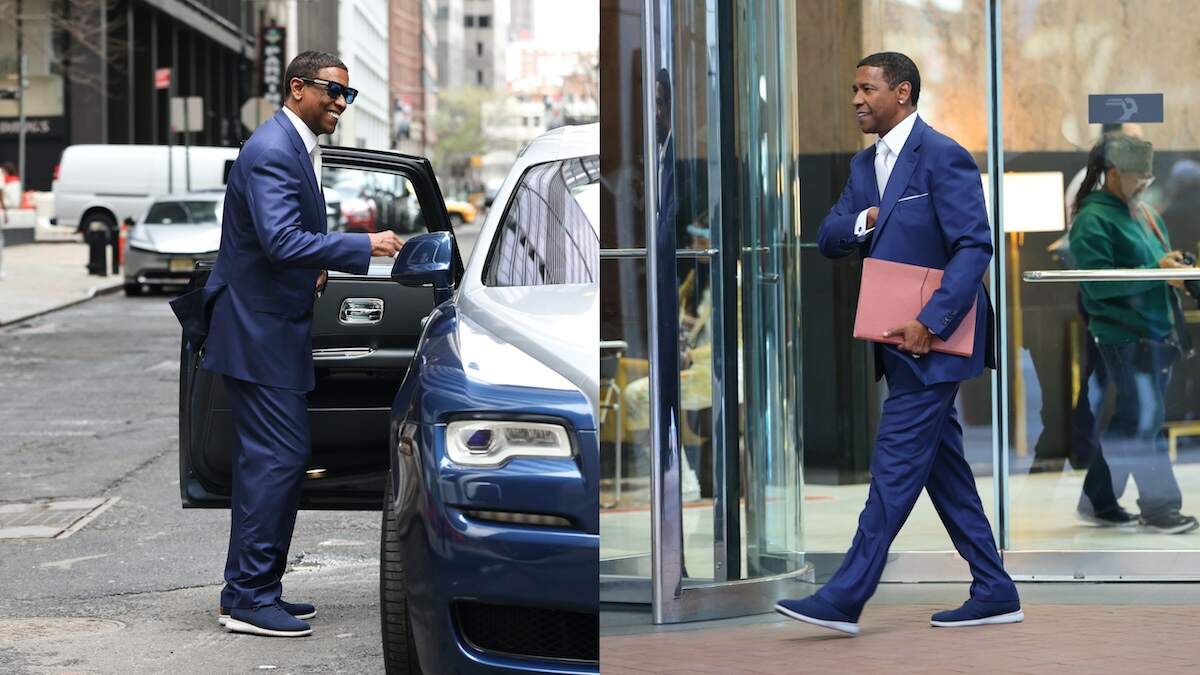Actor Denzel Washington films a scene for High and Low wearing a royal blue suit