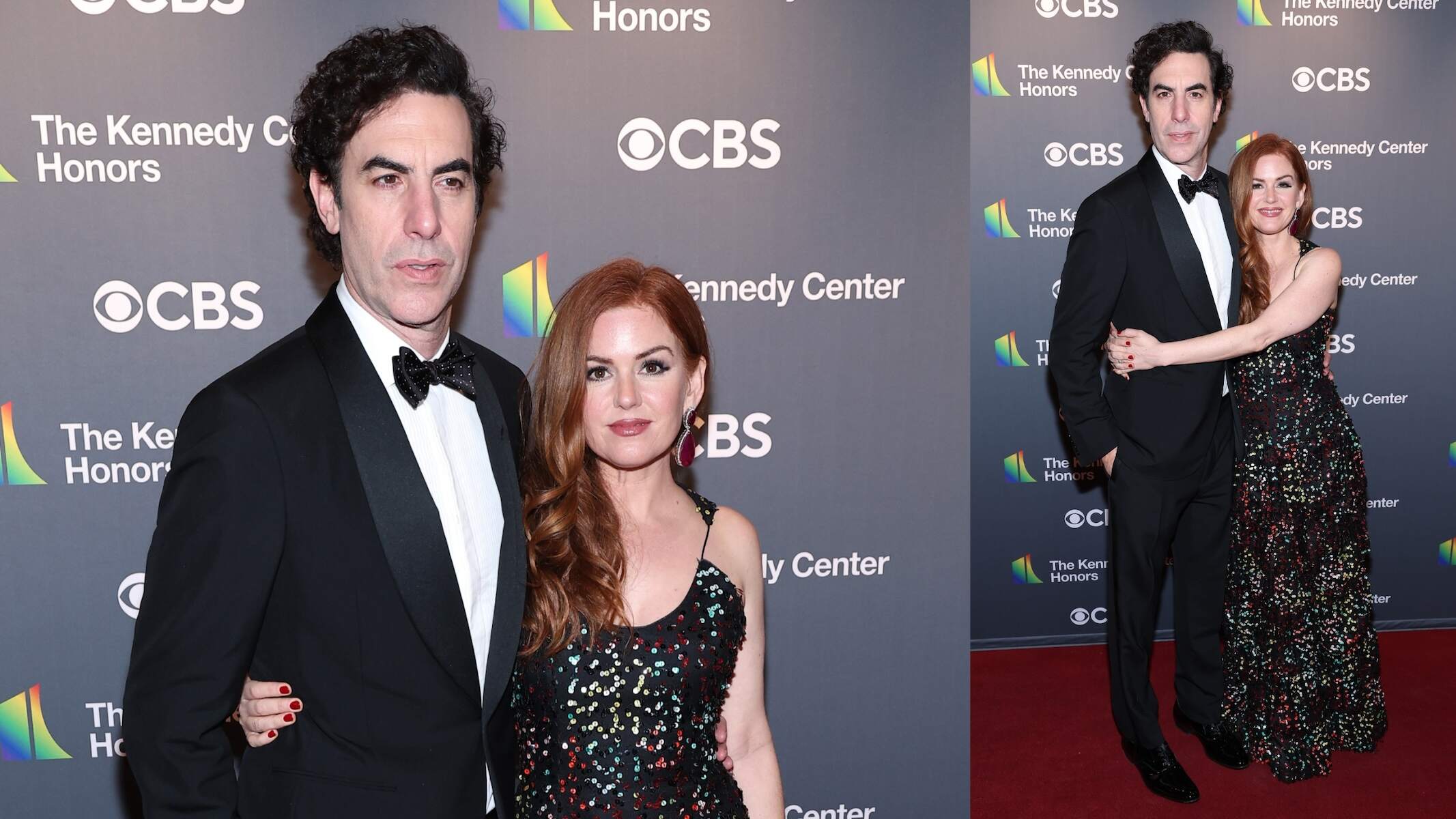 Couple Sacha Cohen and Isla Fisher smile together in formalwear on a red carpet in 2022