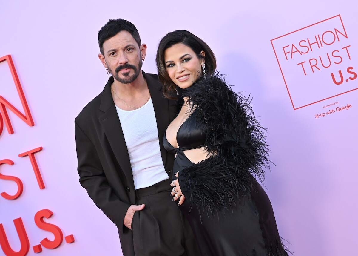 Couple Steve Kazee and a pregnant Jenna Dewan wear a black suit and black gown at an award show