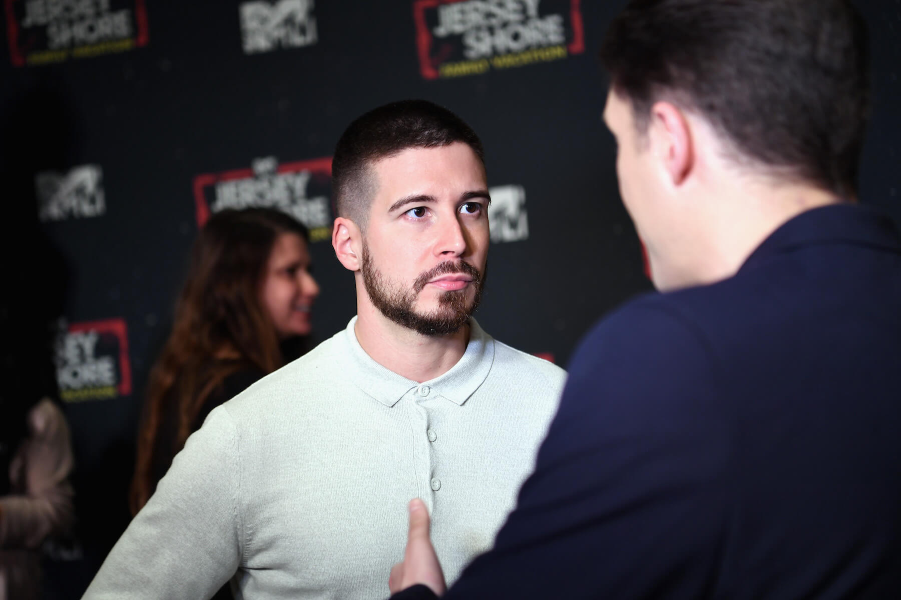 'Jersey Shore' star Vinny Guadagnino speaking to someone at an MTV event