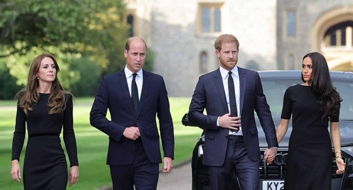 Kate Middleton, Prince William, Prince Harry, and Meghan Markle on the Long Walk at Windsor Castle to view tributes left for the late Queen Elizabeth