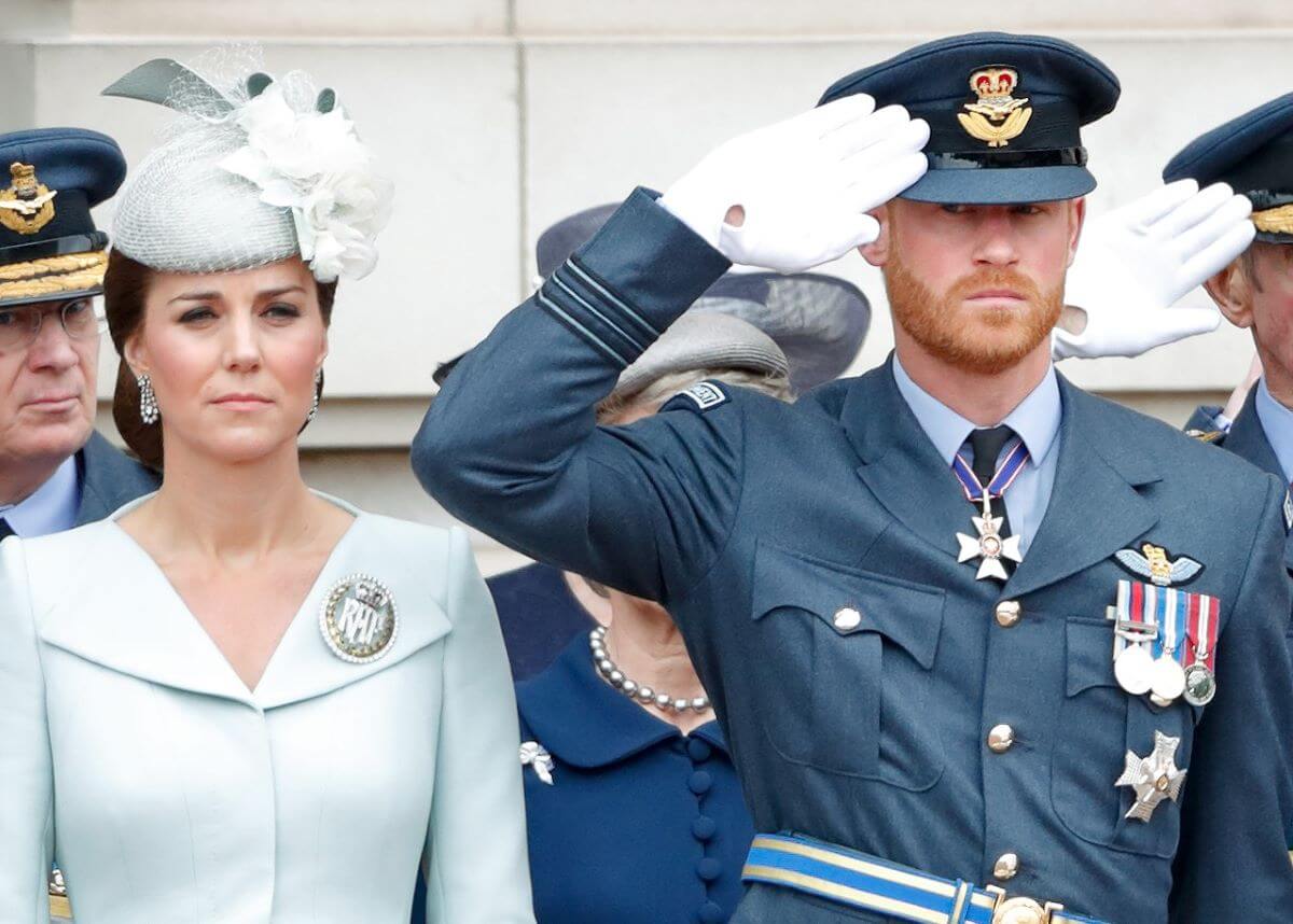 Kate Middleton and Prince Harry attend a ceremony to mark the centenary of the Royal Air Force at Buckingham Palace