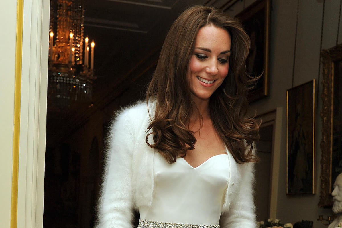 Kate Middleton in her second wedding dress, which wasn't 'relaxed,' per a royal fashion expert.