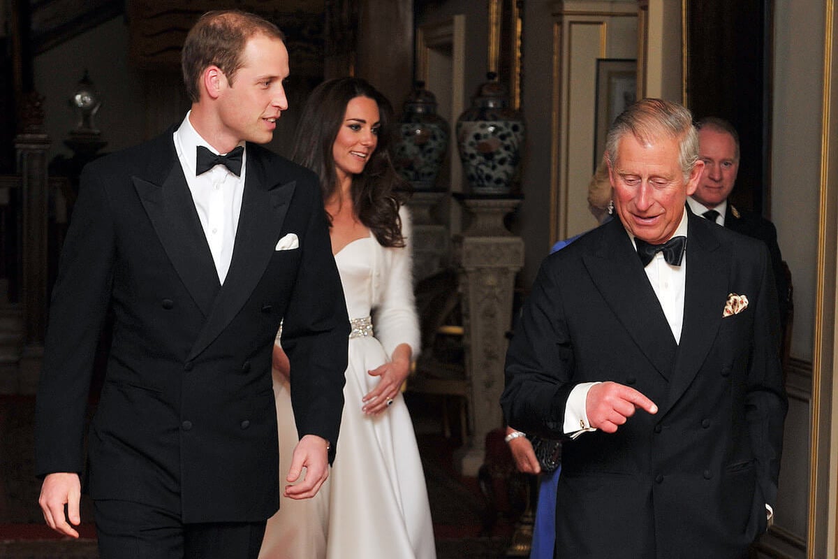 Kate Middleton, whose second wedding dress wasn't 'relaxed,' with Prince William, King Charles, and Queen Camilla in 2011