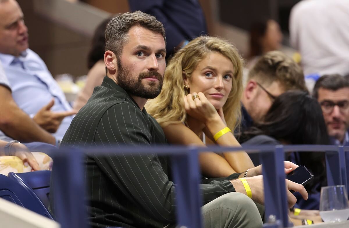 Kevin Love and Kate Bock attend day 12 of the U.S. Open