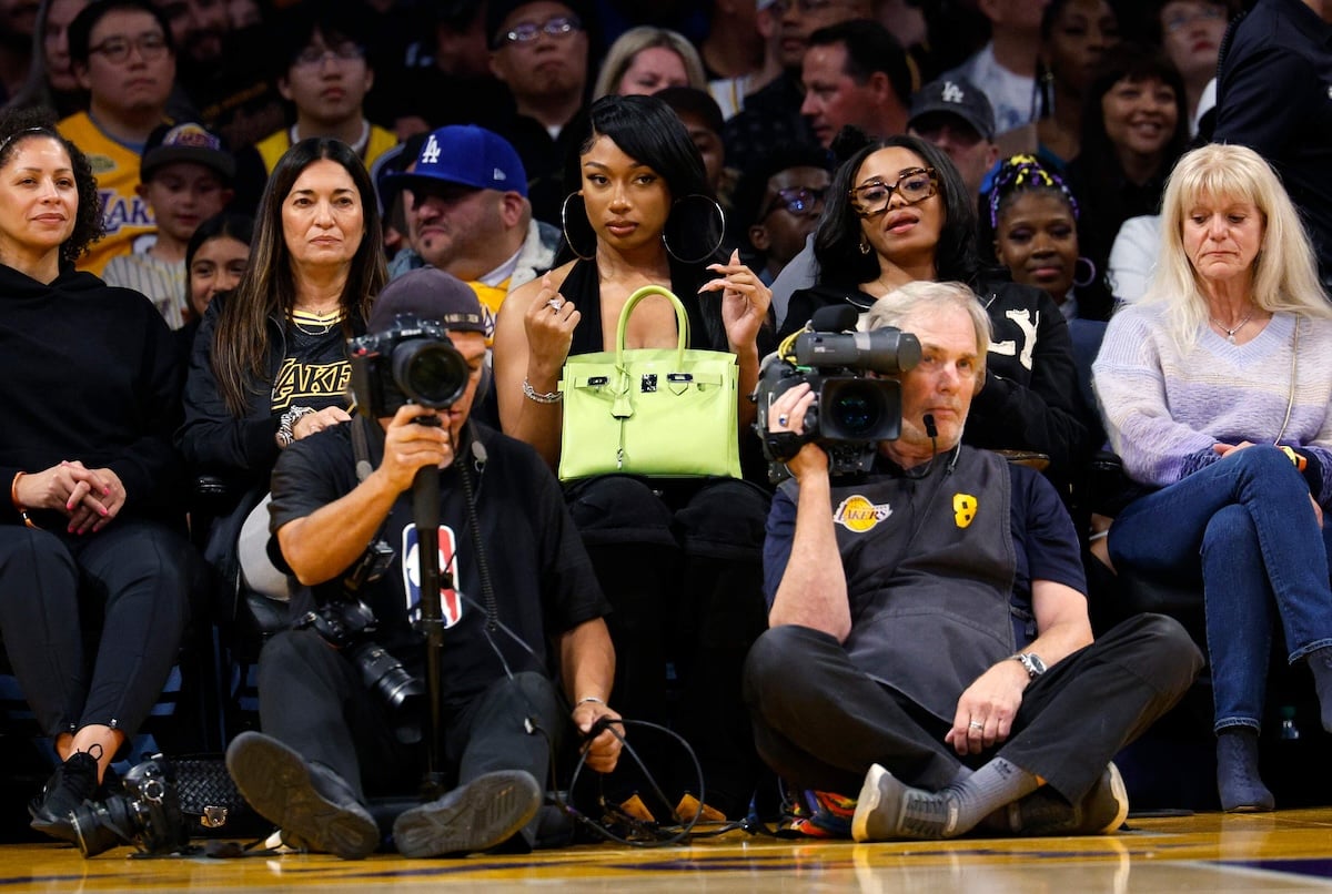 Holding her Birkin bag, Megan Thee Stallion sits at a Lakers game
