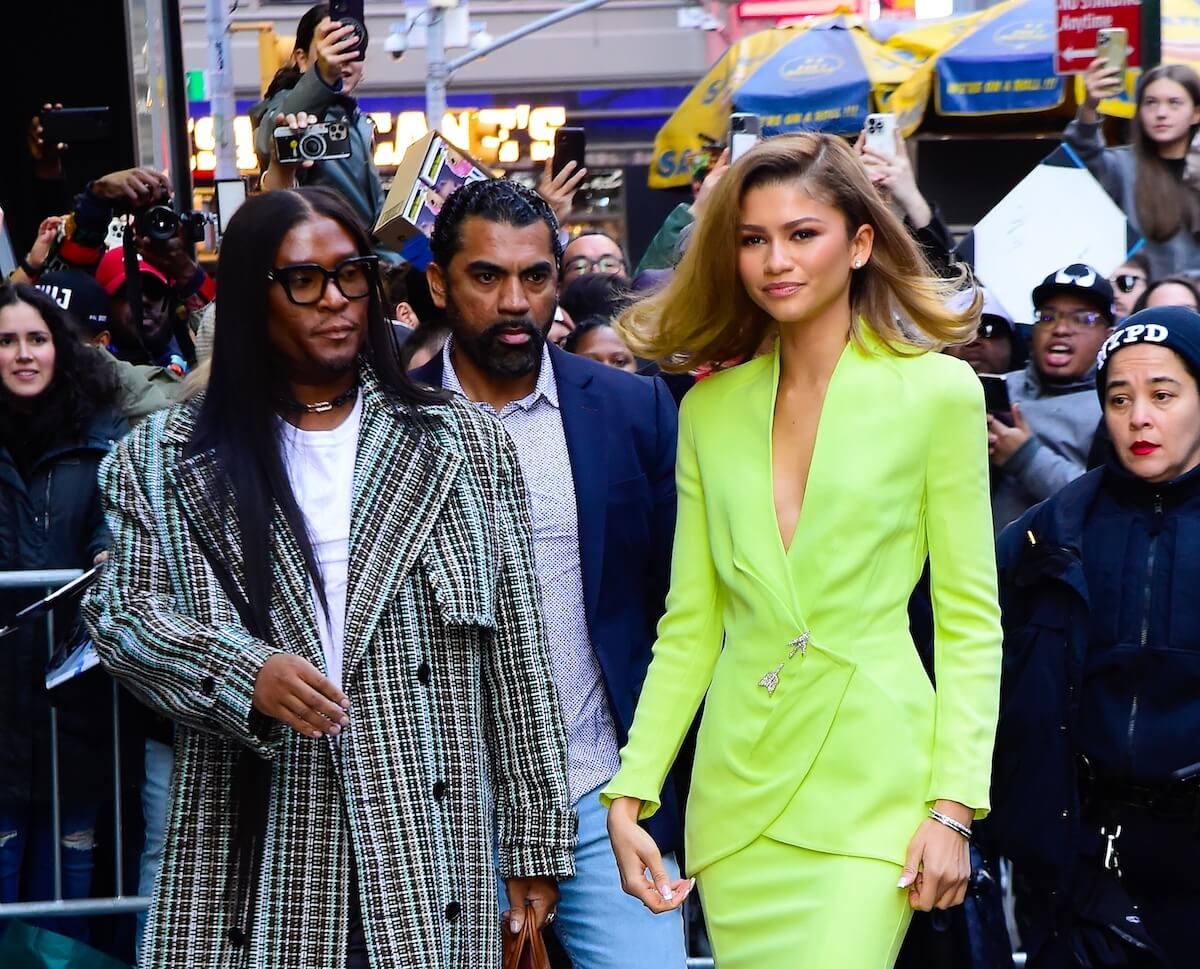 Zendaya in a green skirt suit with Law Roach