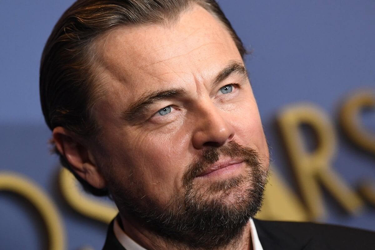 Leonardo DiCaprio posing in a suit at the Academy of Motion Picture Arts and Sciences' 14th Annual Governors Awards