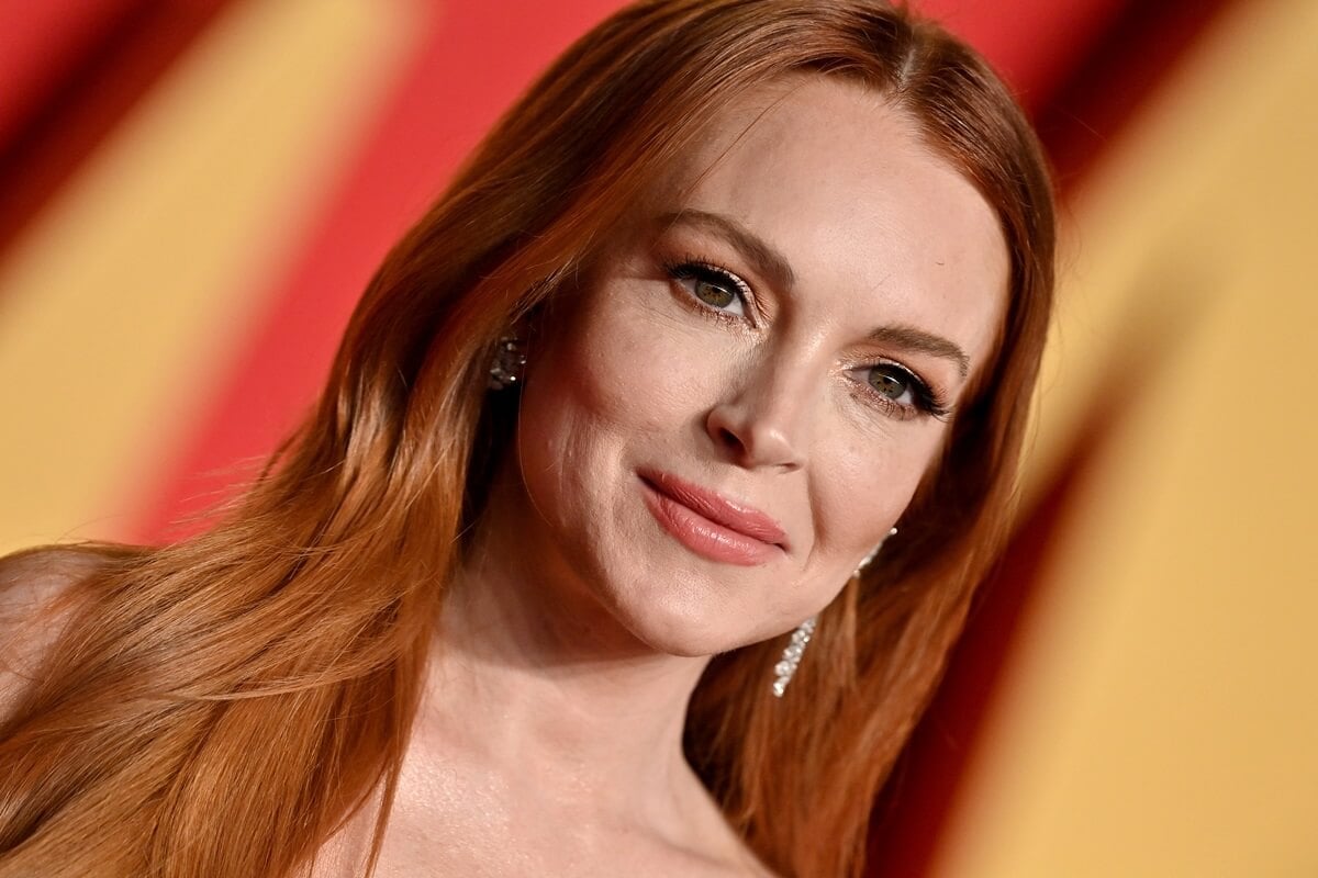 Lindsay Lohan smiling at the 2024 Vanity Fair Oscar party.