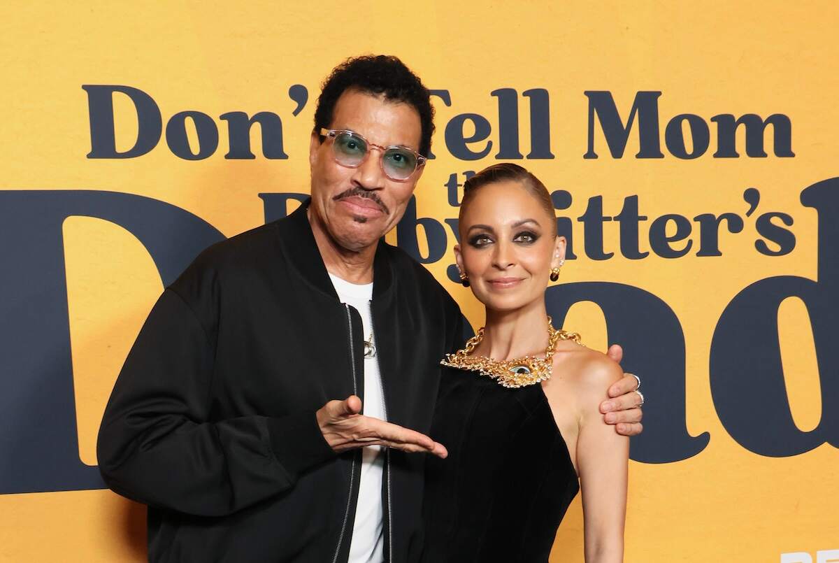 Nicole Richie and Lionel Richie smile on the red carpet at the 'Don't Tell Mom the Babysitter's Dead' premiere
