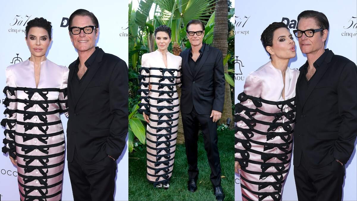 Married couple Lisa Rinna, in a pale pink dress, and Harry Hamlin pose on the red carpet