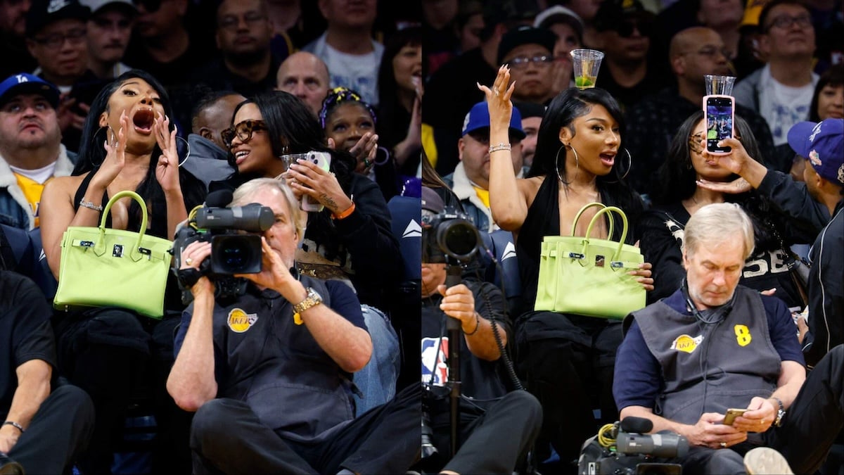 Rapper Megan Thee Stallion and a friend cheer for the Los Angeles Lakers