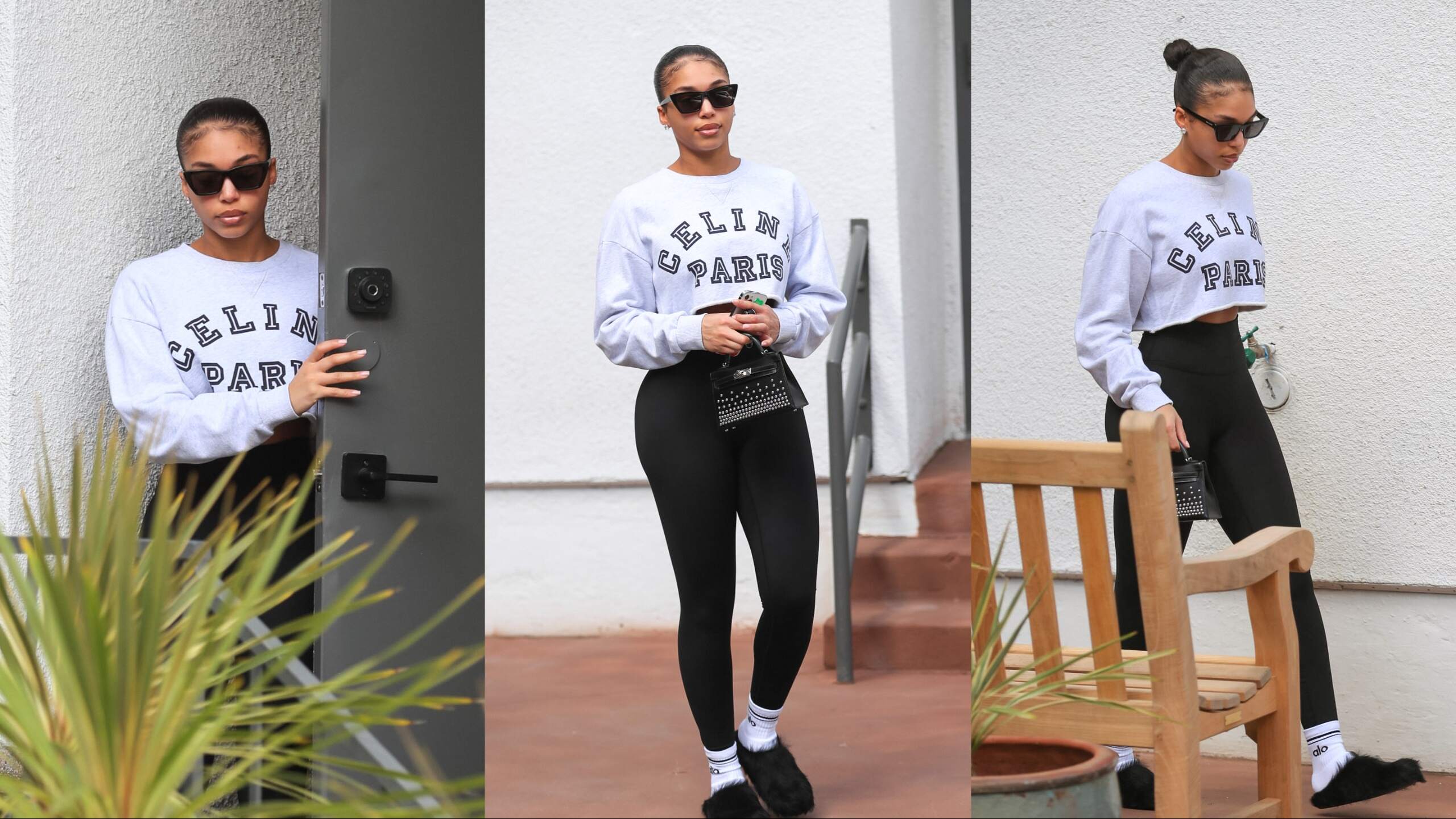 Model Lori Harvey walks out of her workout class in black leggings and a gray cut-off sweatshirt