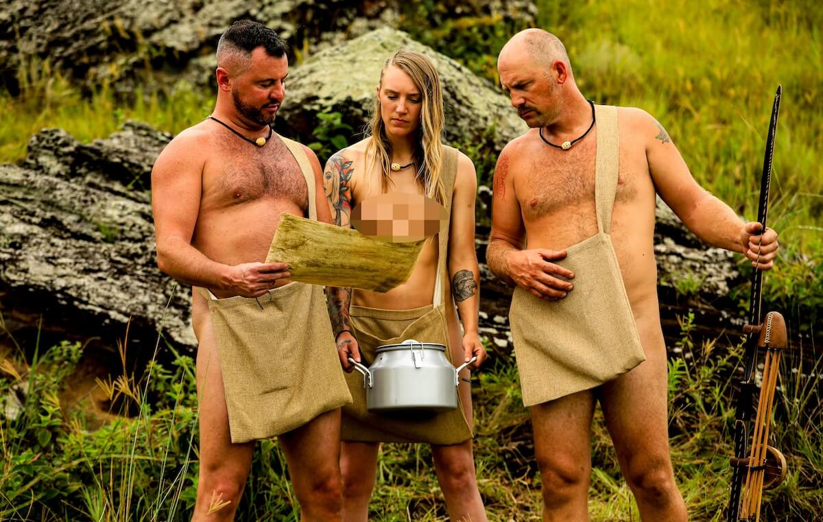 Andrew, Kaiela, and Cole look at the map in 'Naked and Afraid XL'