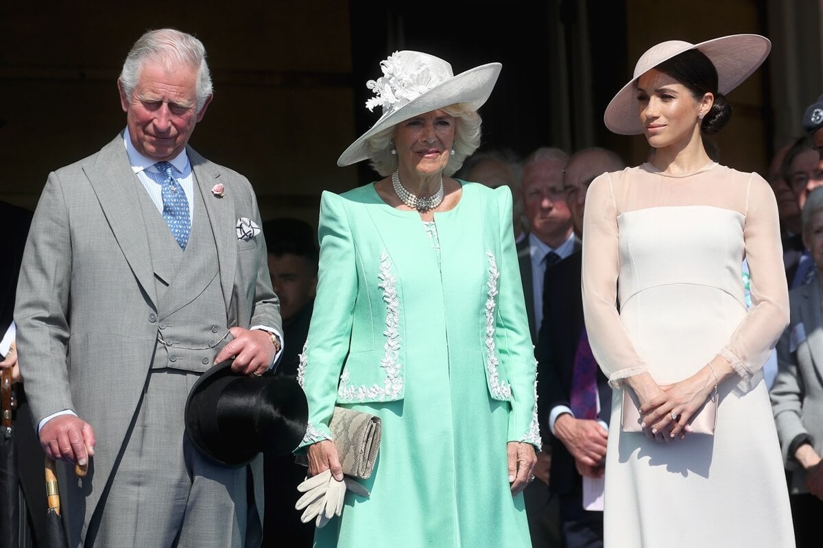 Now-King Charles, Camilla Parker Bowles, and Meghan Markle at Charles' Birthday Patronage Celebration held at Buckingham Palace