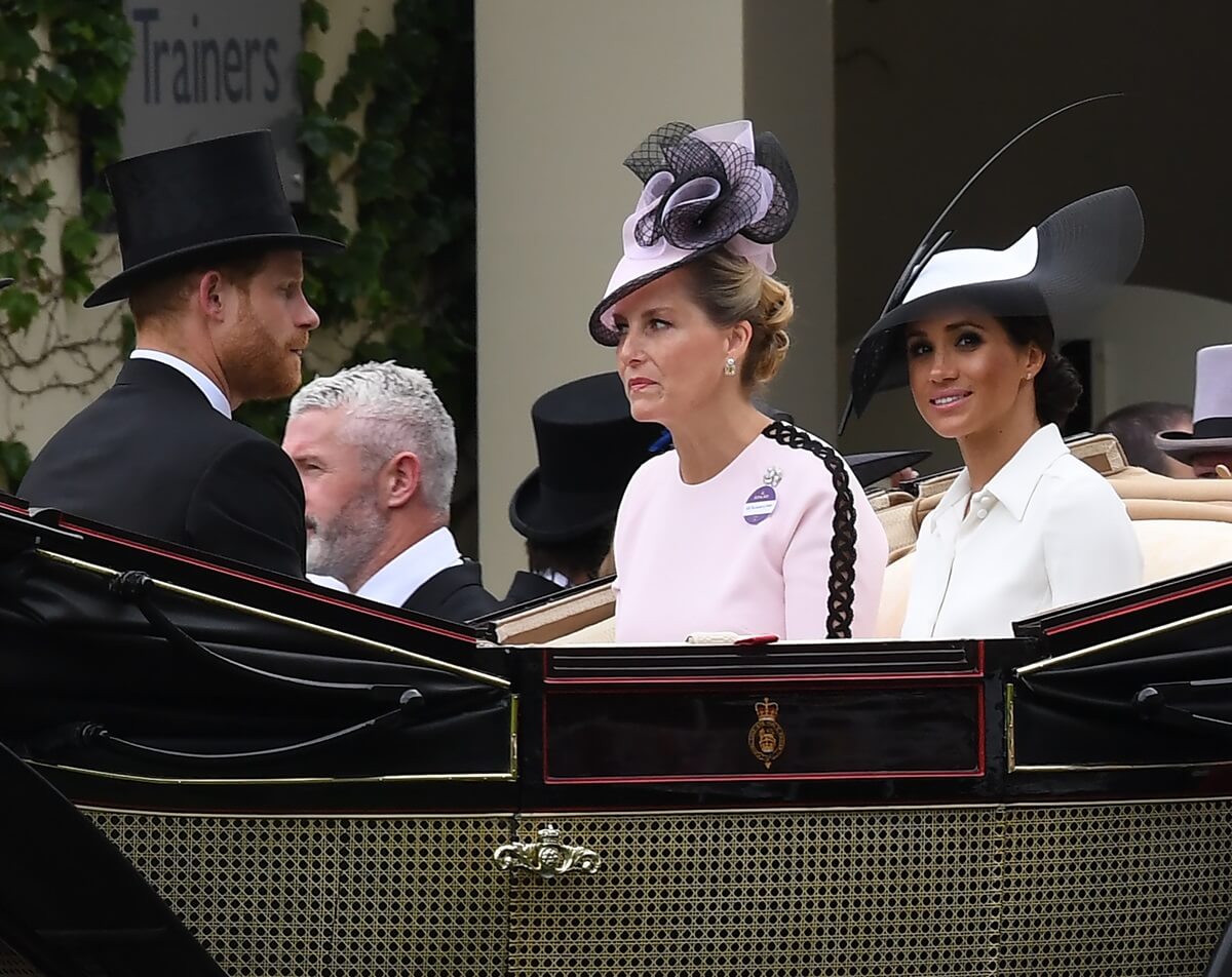 Now-Sophie, Duchess of Edinburgh arrives in an open carriage with Prince Harry and Meghan Markle to Royal Ascot 2018