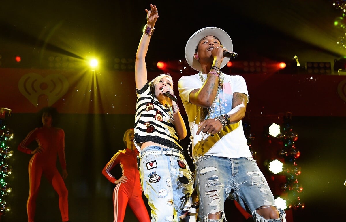 Pharrell Williams performing alongside Gwen Stefani during iHeartRadio Jingle Ball 2014.