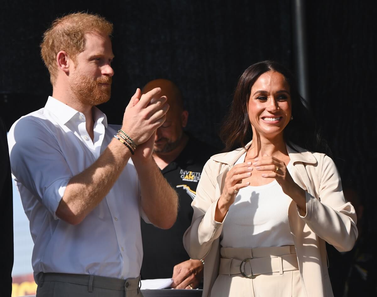 Prince Harry and Meghan Markle at swimming medal ceremony during the Invictus Games Düsseldorf 2023