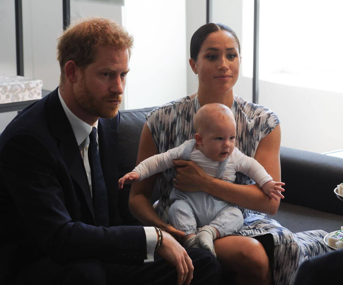 Prince Harry and Meghan Markle with their son Archie as they meet with Archbishop Desmond Tutu in Cape Town, South Africa