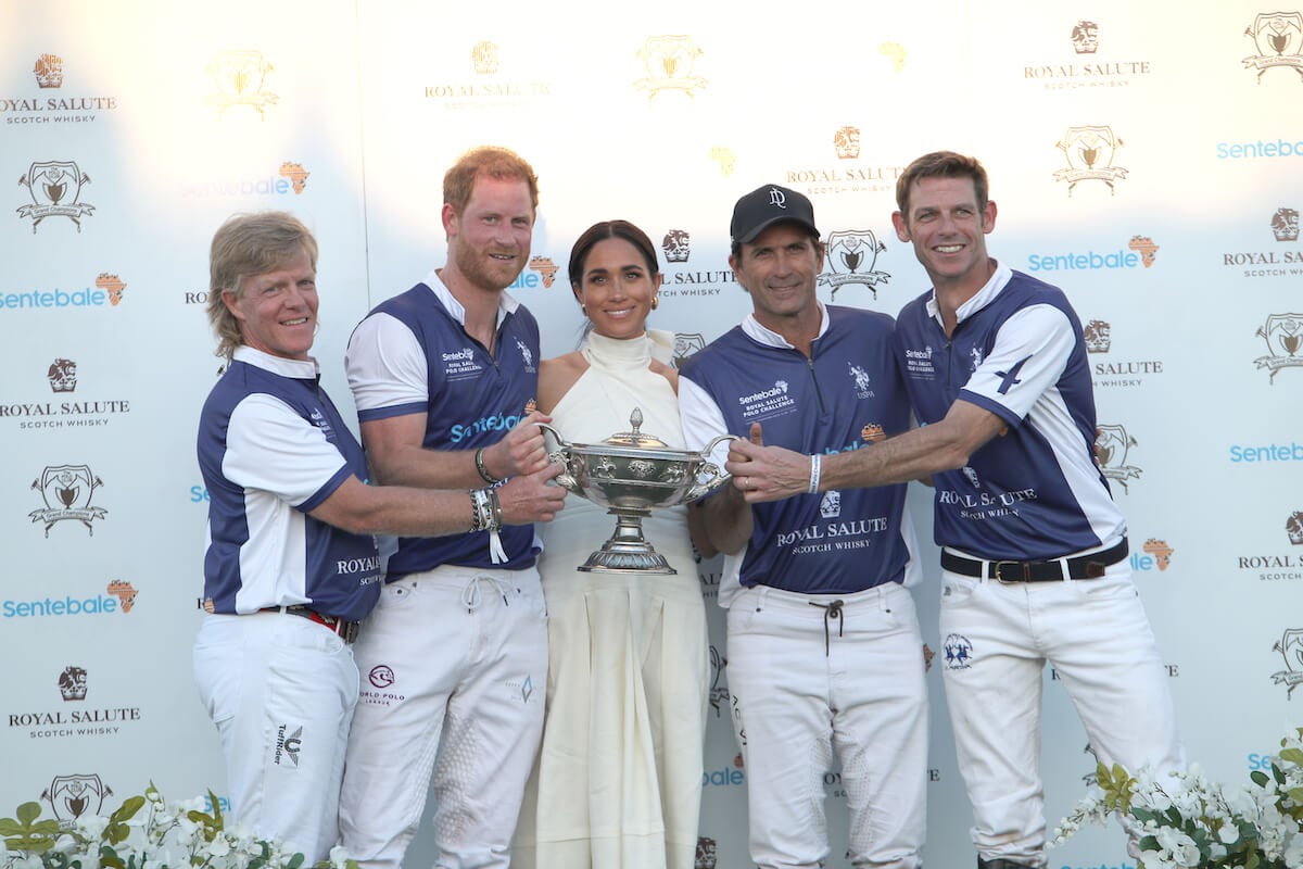 Prince Harry, whose Netflix show about polo shows he's an 'elite,' with Meghan Markle at a polo match
