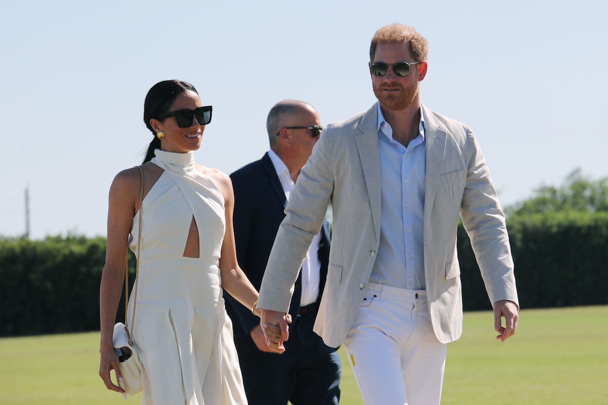 Prince Harry, whose new Netflix show about polo shows he's an 'elite,' with Meghan Markle at a polo match