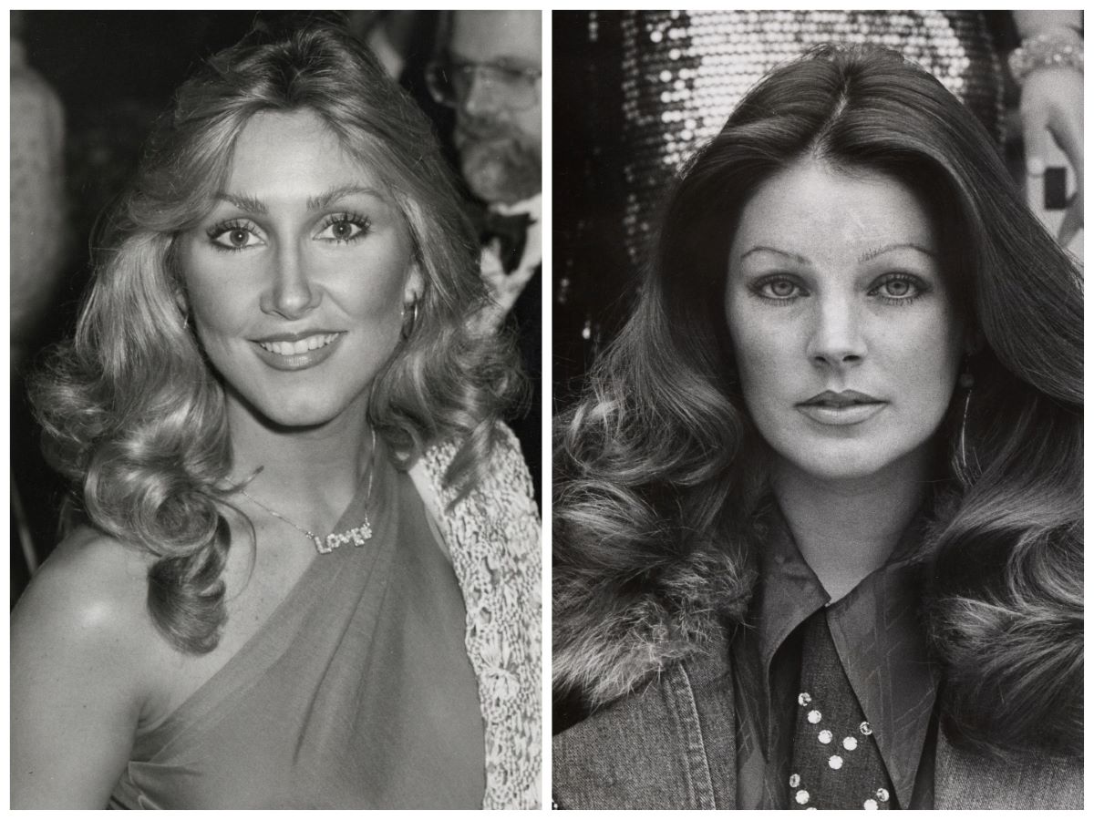 A black and white picture of Linda Thompson wearing a one-shoulder dress. Priscilla Presley wears a denim jacket and a tie.