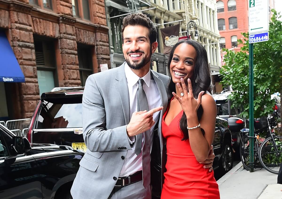 Rachel Lindsay of 'The Bachelorette' shows off her engagement ring while standing next to Bryan Abasalo