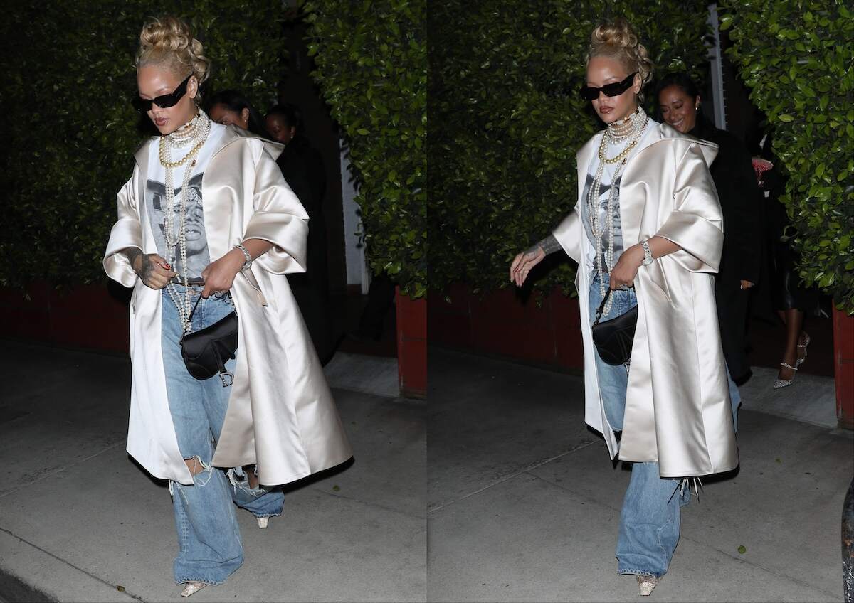 Singer Rihanna wears pearl necklaces and baggy jeans with blonde hair as she enters a restaurant in Santa Monica