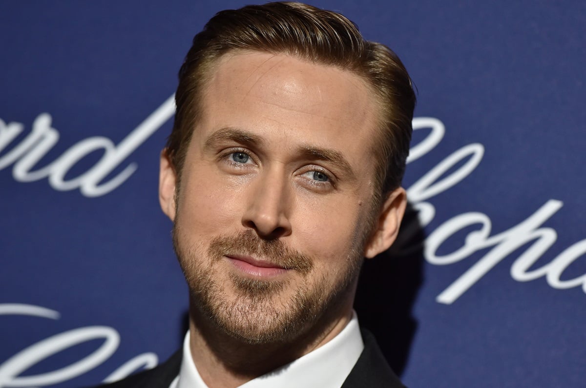 Ryan Gosling posing in a suit at the 28th Annual Palm Springs International Film Festival Film Awards.